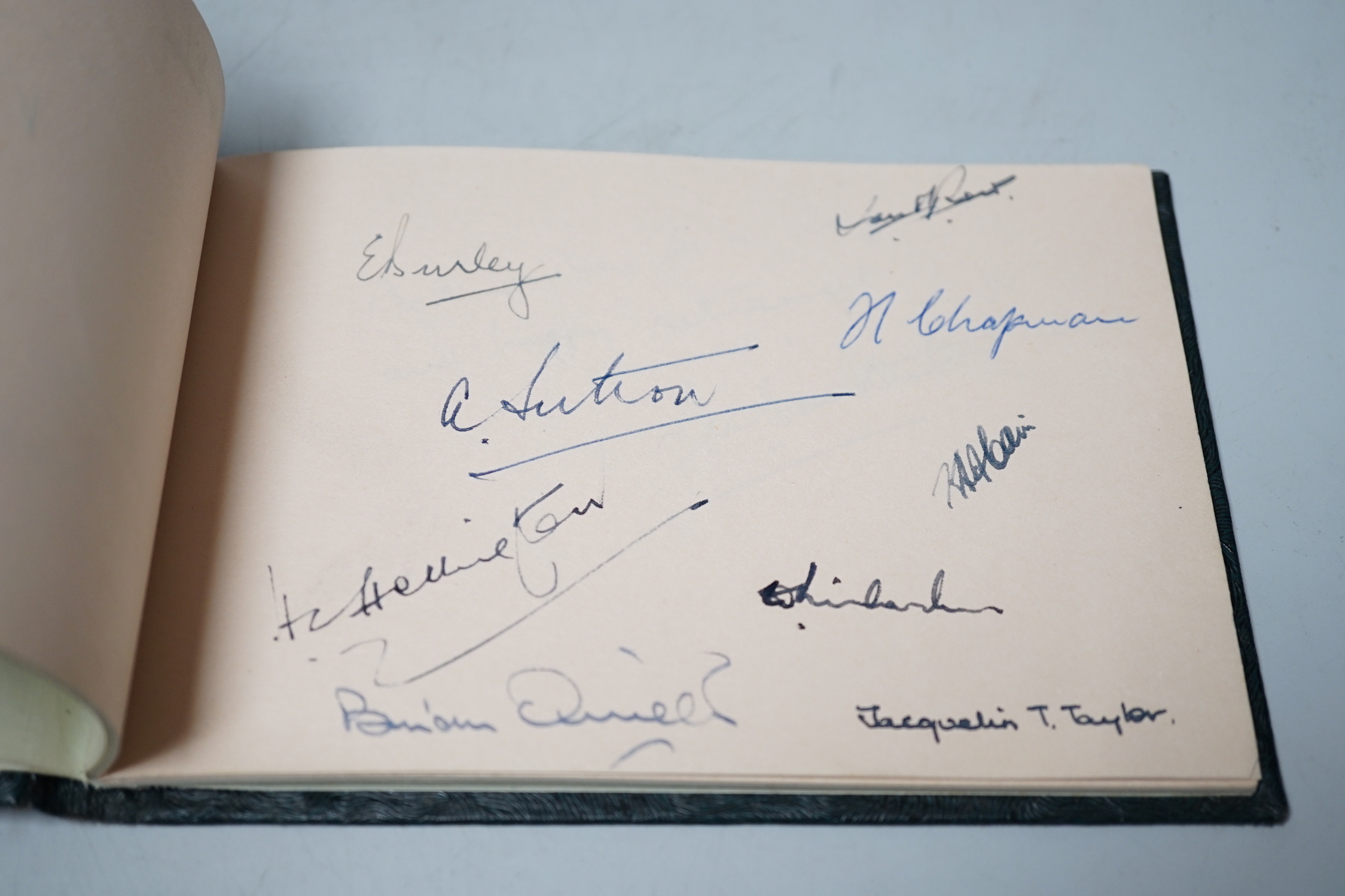 An Autograph book presented to EB Thomas esquire MBE, 4 January 1960 on the occasion of his retirement from public service with the Ministry of housing and local government, signed by his colleagues